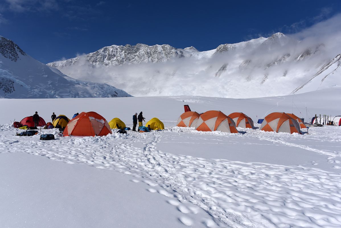02C The Tents At Mount Vinson Base Camp On The Branscomb Glacier With Branscomb Peak, Mount Vinson, Silverstein Peak, Principe de Asturias Peak Above